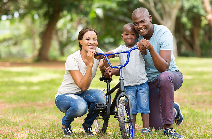 mom-dad-son-bike