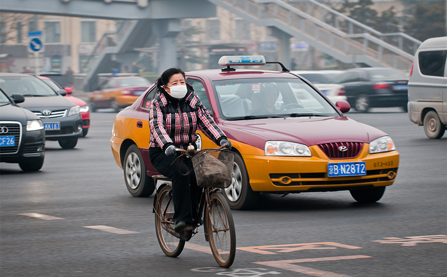 woman-bike-pollution