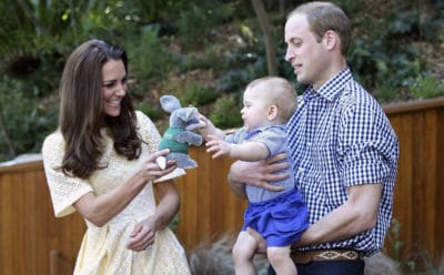 Photo of Royal Kate Middleton, Prince William, and child.