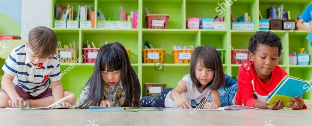 stock-photo-group-of-diversity-kid-lay-down-on-floor-and-reading-tale-book-in-preschool-library-kindergarten-1054521569